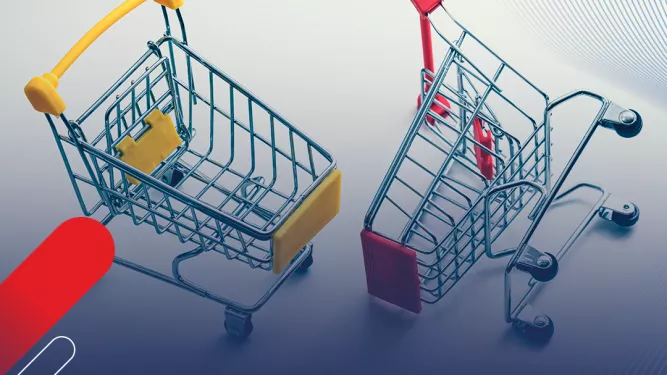 Dois carrinhos de compras, sendo um com detalhe amarelo e o outro vermelho.